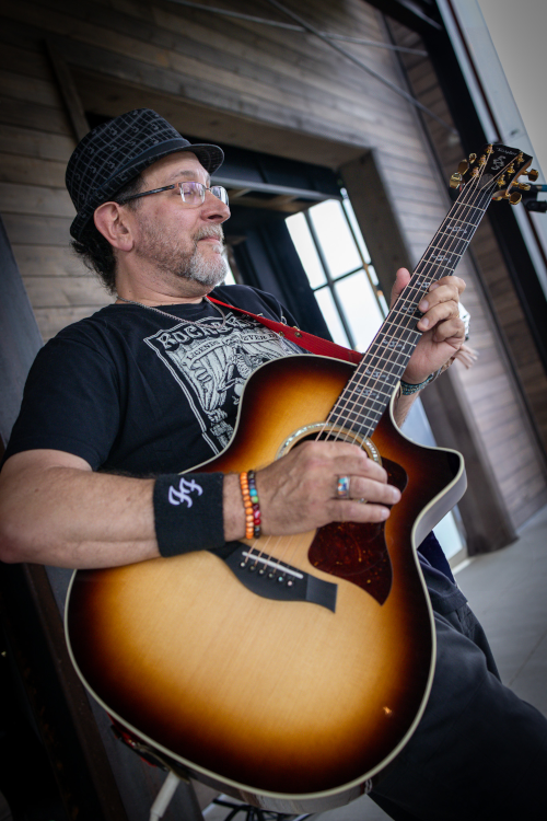 Eliot Levy playing guitar